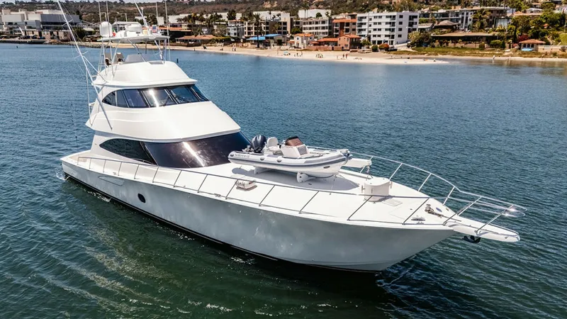 Slide: The Image of Aerial View of Skybridge Yacht This stunning aerial view showcases the sleek design of the 2019 Viking 80 Skybridge, 'PARTY OF FIVE'. The expansive bow features ample space for lounging, while the elegant skybridge offers panoramic views. The vessel's clean lines and modern styling are - 6478773