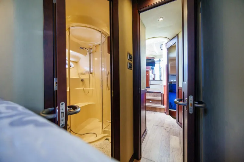 Slide: The Image of 2006 52 Sea Ray Sedan Bridge Zoe Grace Master Head (1) - 5934363