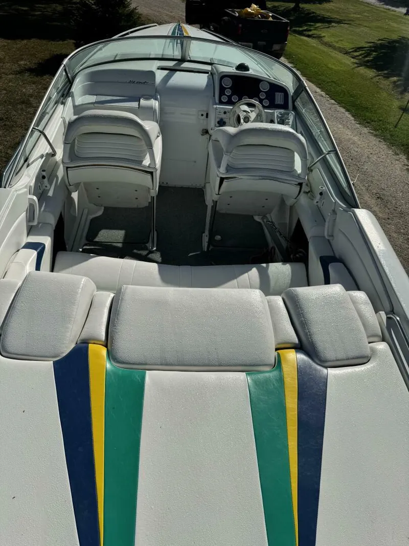 Slide: The Image of Formula 312 FASTech Bolster Helm Seats Drop-down bolster helm seating and cockpit upholstery on 1999 Formula 312 FASTech performance boat. - 5945912