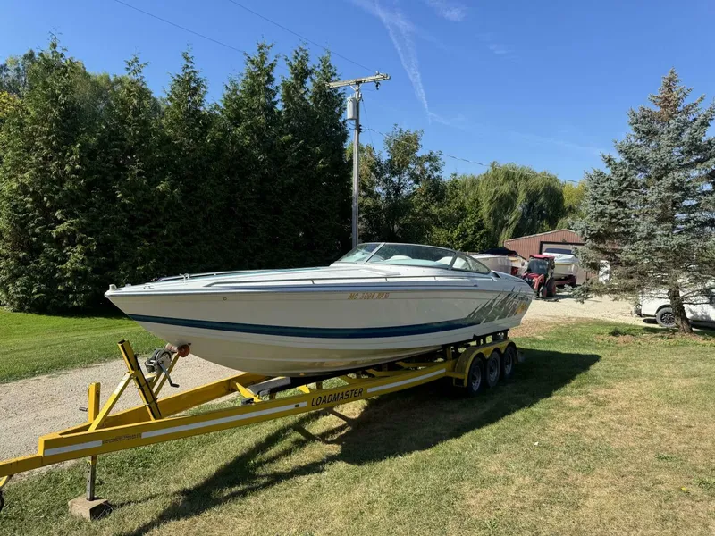 Slide: The Image of Formula 312 FASTech Port Profile Port side exterior profile of 1999 Formula 312 FASTech offshore deep-V performance boat. - 5945918