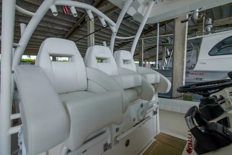 Slide: The Image of Regulator 41 - Miss Megan - Helm Seats 2021 Regulator 41 Center Console Miss Megan - 7653996
