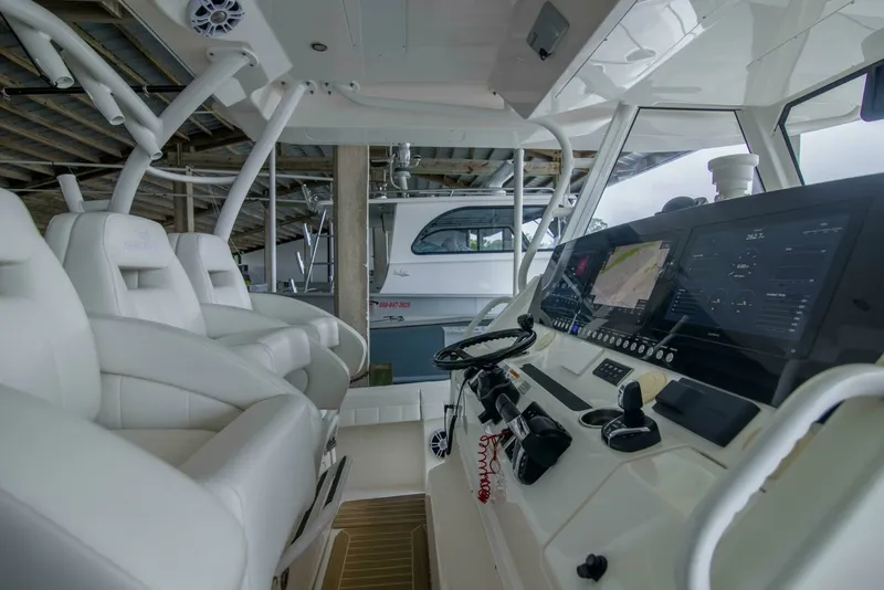 Slide: The Image of Regulator 41 - Miss Megan - Helm Seats and Electronics 2021 Regulator 41 Center Console Miss Megan - 7653994