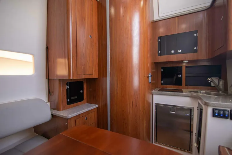 Slide: The Image of Regulator 41 - Wound Up II - Interior Cabin Galley 2016 Regulator 41 Center Console - Wound Up II - 5960050