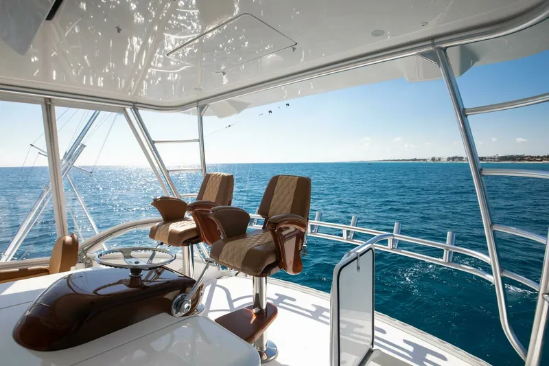 Slide: The Image of Viking 48 - Dorothy Marie - Flybridge Helm Seats 2018 48 Viking Convertible - Dorothy Marie - 7653252