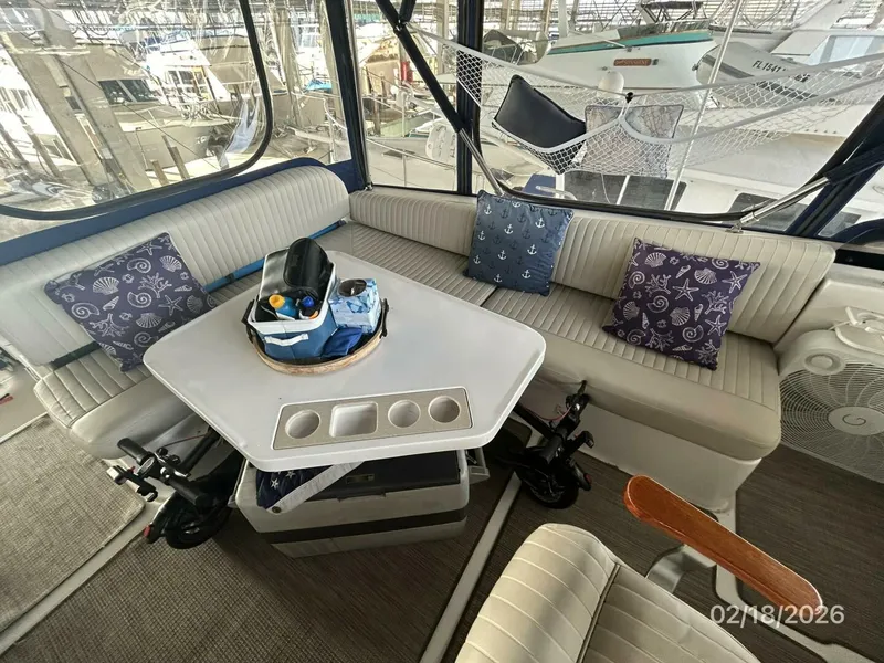Slide: The Image of 43' Mainship flybridge port seating - 5961195