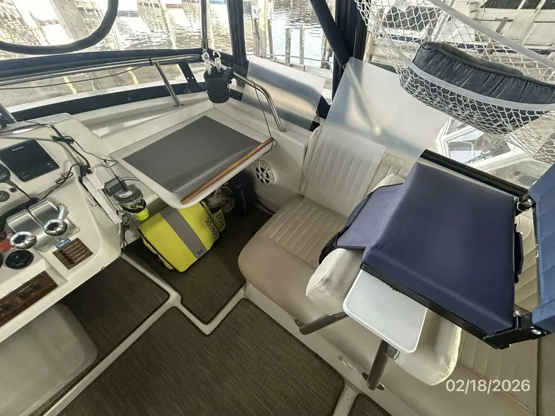 Slide: The Image of 43' Mainship flybridge starboard forward seating - 5961198