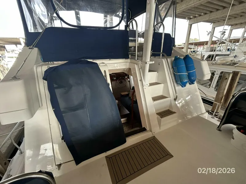 Slide: The Image of 43' Mainship trunk cabin forward - 5961297