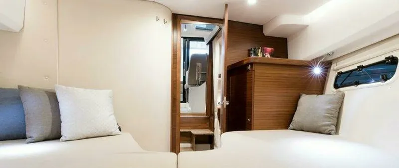 Slide: The Image of Nimbus 305 Coupe Cabin 2026 Nimbus 305 Coupe - 7647004