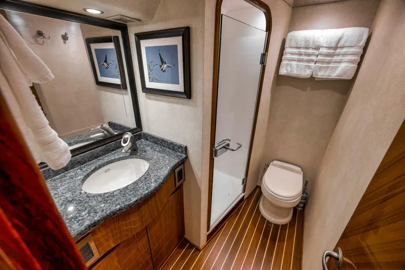 Slide: The Image of 2011 Viking 76 Enclosed Bridge- TEUSEAS- MAster Stateroom Head - 5966538
