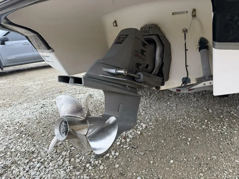 Slide: The Image of Volvo-Penta-Duoprop-DP-Outdrive-Four-Winns-250-Horizon Rear view showcasing the Volvo Penta Duoprop (DP) sterndrive with counter-rotating stainless steel propellers. This drive system provides enhanced low-speed maneuverability, increased thrust, and improved fuel efficiency. - 5970678