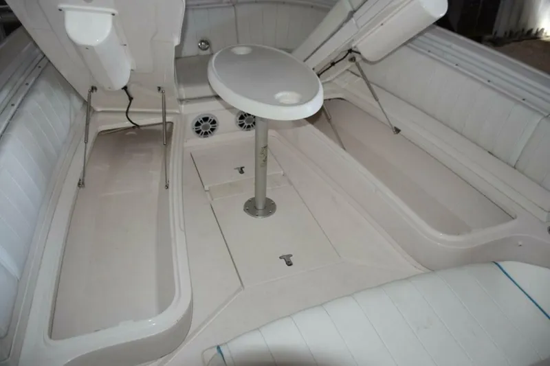 Slide: The Image of Larger Storage Compartments Accessed With Gas Shock Lifts Beneath Forward Seating Bases - 5972610