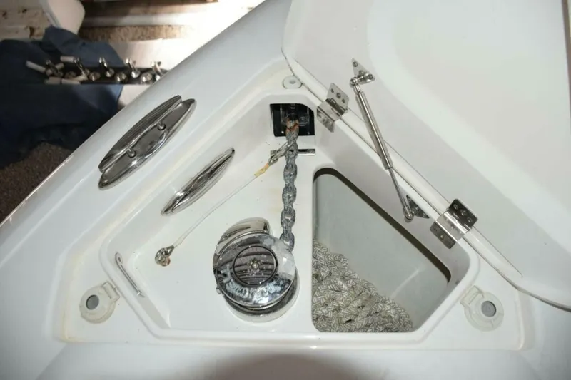 Slide: The Image of Electric Anchor Windlass With Safety Lanyard And Thru Hull Chute   Stainless Claw Anchor, Chain Lead And Nylon Rode. Switches Here - 5972611