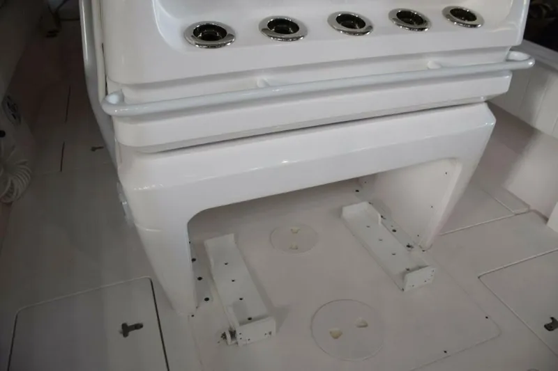 Slide: The Image of Behind Helm Seat Console, Drink Holder Or Rod Holders And Safety Grab Railing, Cooler Chocks Beneath. - 5972618