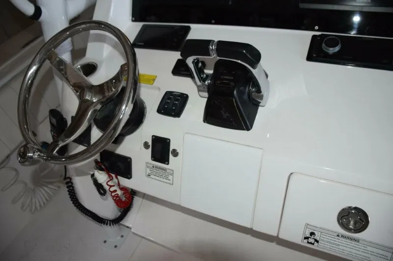 Slide: The Image of  Tiltable Helm Wheel Yamaha Control Binnacle And Digital Engine Display, Bow Thruster And Trim Tab Controls. - 5972588