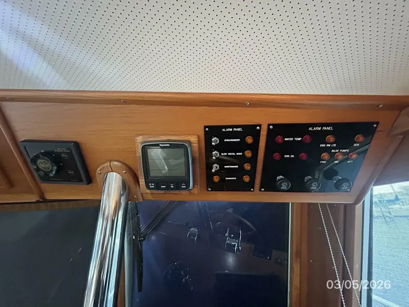 Slide: The Image of 42' Grand Banks lower helm overhead electronics1 - 5973580