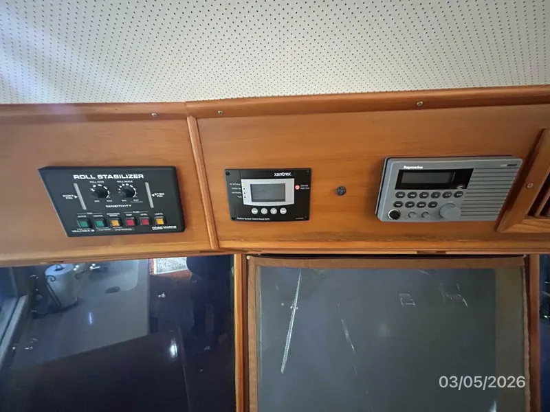 Slide: The Image of 42' Grand Banks lower helm overhead electronics2 - 5973581
