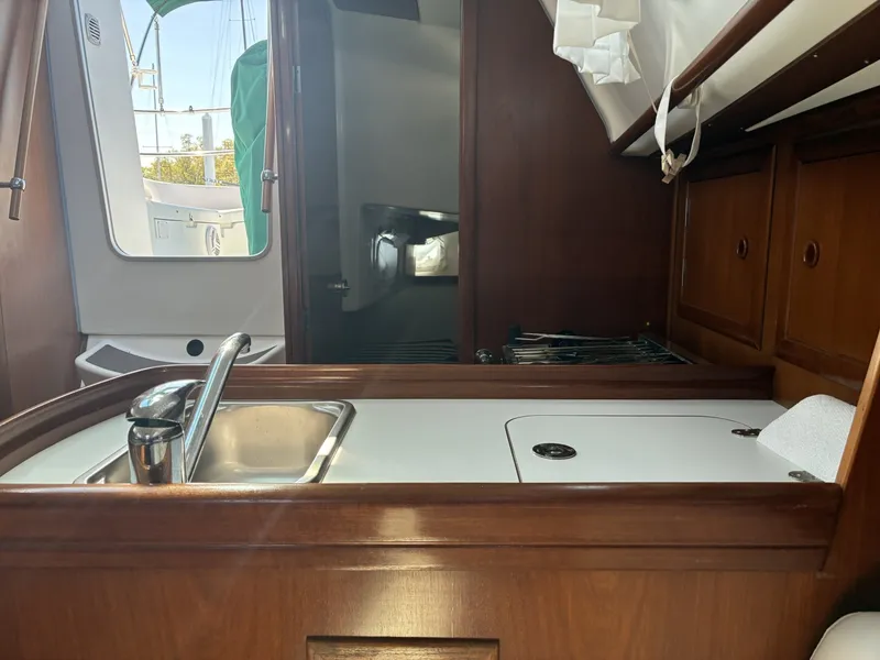 Slide: The Image of 2003 Beneteau Oceanis 311 - Galley Galley countertop and sink - 5999391