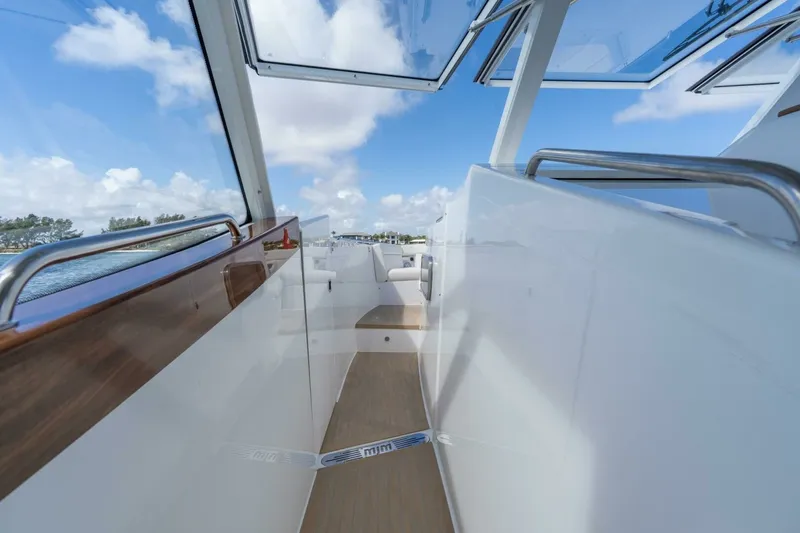 Slide: The Image of MJM 47X 47-003 - Port Side walkway 2026 MJM 47X - 7010875