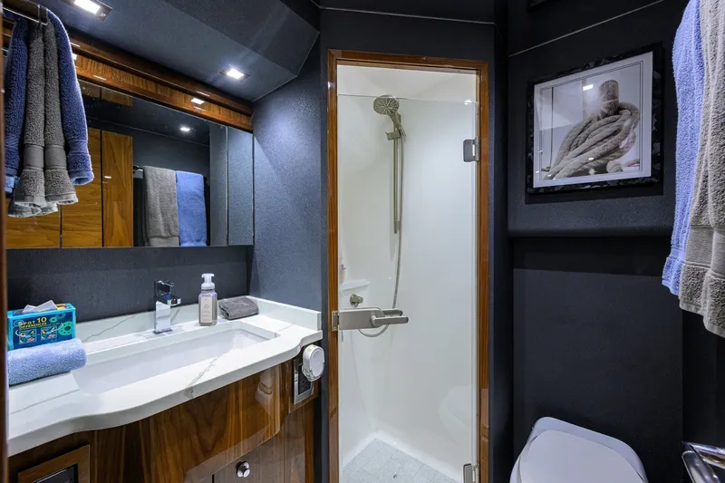 Slide: The Image of Viking 80 MERCEDES - Mid Starboard Guest Head 2023 Viking 80 Convertible MERCEDES - 7658249