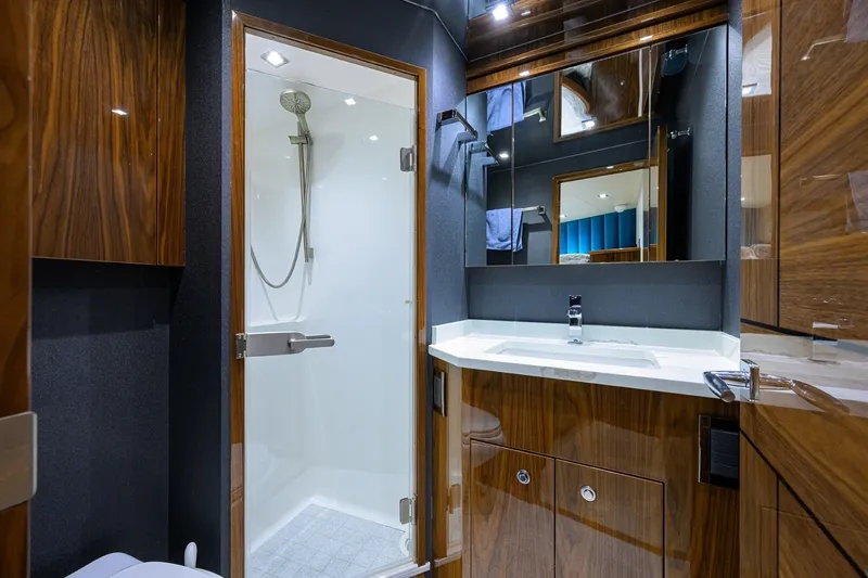 Slide: The Image of Viking 80 MERCEDES - Forward Starboard Guest Head 2023 Viking 80 Convertible MERCEDES - 7658247