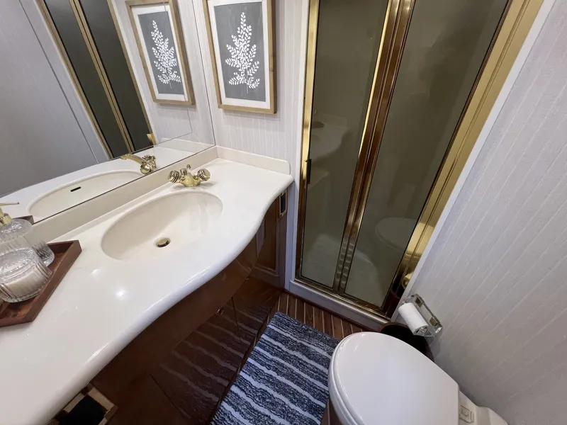 Slide: The Image of Viking 52 LET IT RAIN - Master Stateroom Ensuite Head 2003 Viking 52 
LET IT RAIN - 6047463