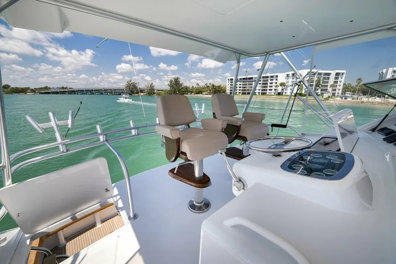 Slide: The Image of Viking 52 - THE HURRICANE - Flybridge Helm 2003 Viking 52 Convertible - THE HURRICANE - 7866149