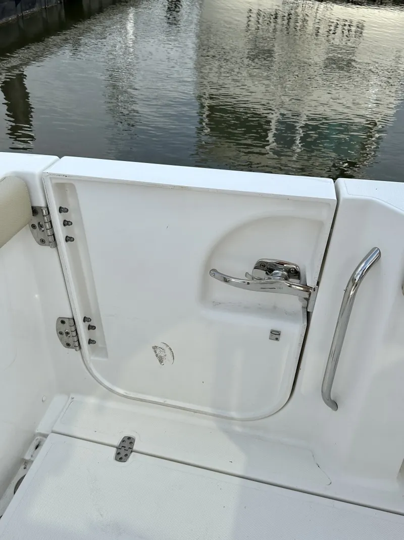 Slide: The Image of PURSUIT 28 S288 - Access door 2019 Pursuit S288 Center Console - 6037245