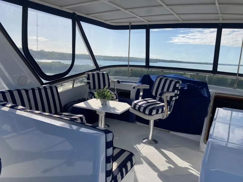 Slide: The Image of Flybridge Seating And Hatch Open To Stairs Down To Pilothouse - 6062827