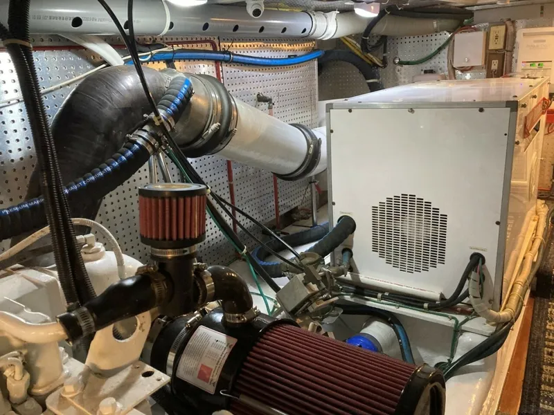 Slide: The Image of Aft Of Starboard Motor, Note New Exhaust Riser, Generator In Sound Shield Box - 6062906