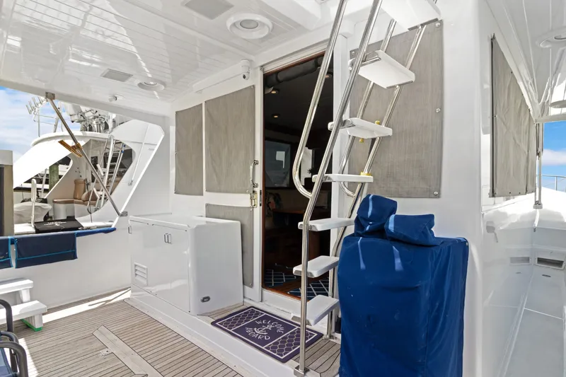 Slide: The Image of Deckhouse Snap On Window Shades And Side Deck Access , Note Large Overhang From Flybridge Deck - 6062892