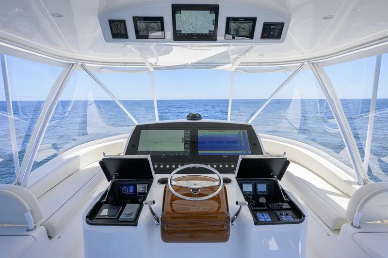 Slide: The Image of Viking 54 - Dog House - Flybridge - Flybridge, Helm Electronics 2024 Viking 54 Convertible - Dog - 7084239