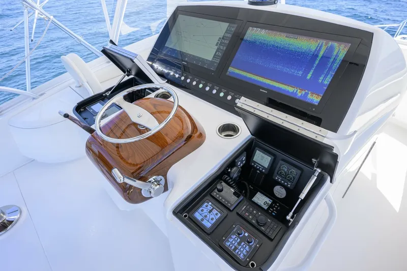 Slide: The Image of Viking 54 - Dog House - Flybridge - Flybridge, Helm Electronics 2024 Viking 54 Convertible - Dog - 7084240