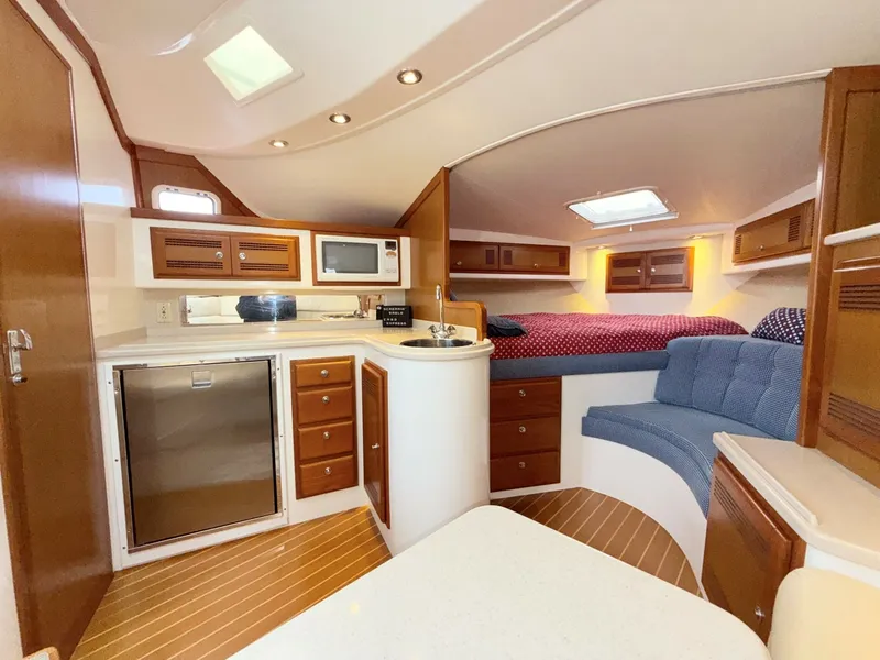 Slide: The Image of Cabo 35 SCREAMIN' EAGLE - Galley and Cabin 1999 Cabo 35 Express SCREAMIN' EAGLE - 6079597