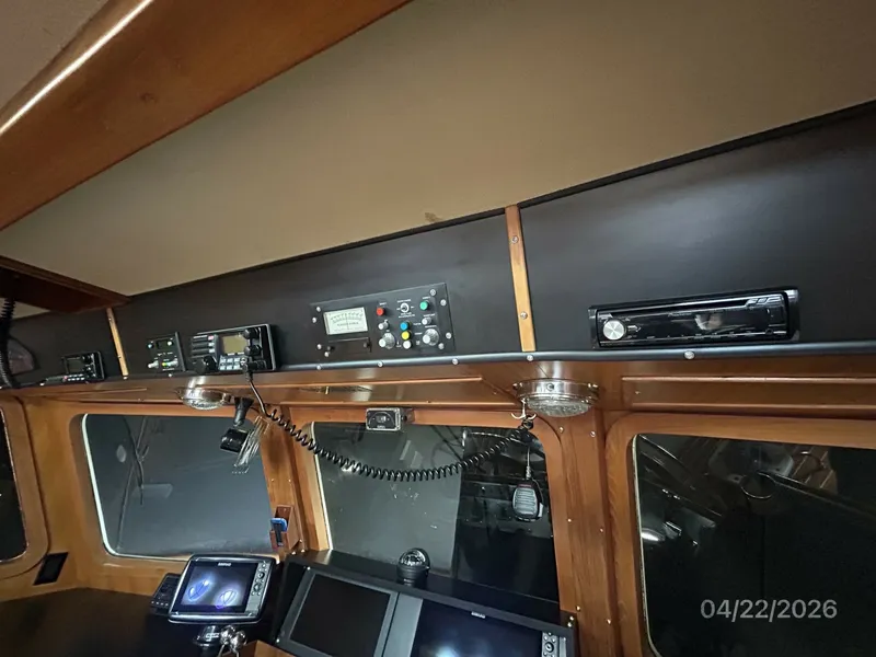 Slide: The Image of 49' DeFever pilothouse helm overhead electronics - 6062110