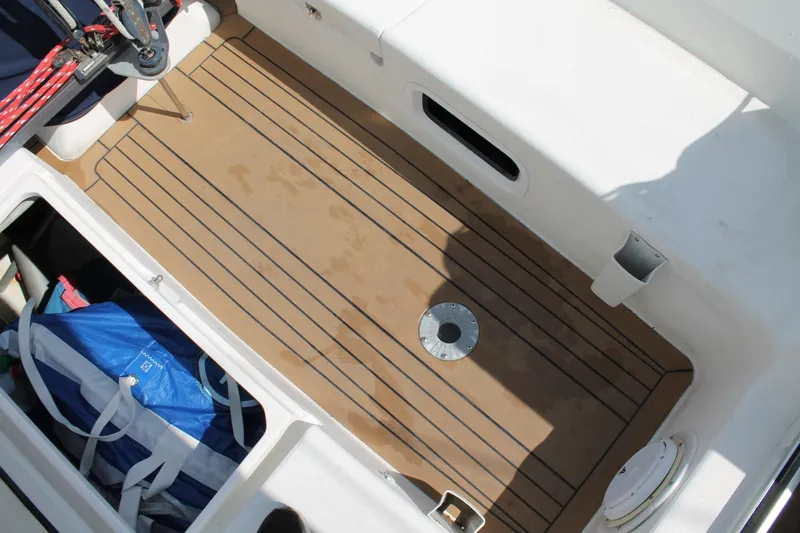 Slide: The Image of J/109 Shoal Draft with Carbon Spars Sea Foam cockpit sole and cockpit locker - 6067202