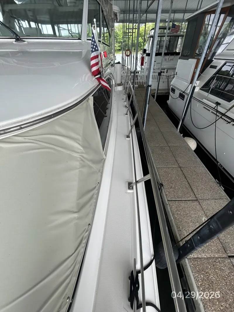 Slide: The Image of 44' Cruisers port side deck1 - 6075654