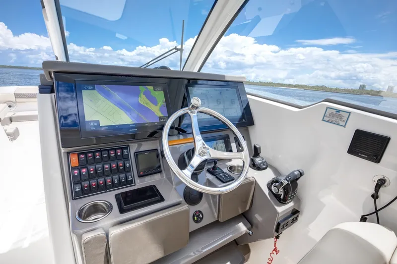 Slide: The Image of Pursuit 37 - Irish Ayes - Helm Deck Electronics 2020 Pursuit DC 365 - Irish Ayes - 7866873