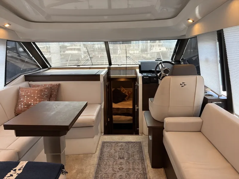 Slide: The Image of 2020 Prestige 420S -  Salon, dinette, settee, nav and lower helm - 6081639