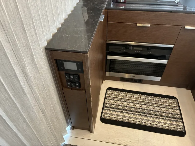 Slide: The Image of 2020 Prestige 420S -  Galley port with stove top and oven - 6081669
