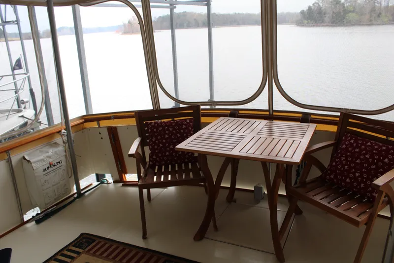 Slide: The Image of 42 ft Bertram - Aft Deck Dining Area - 6163820