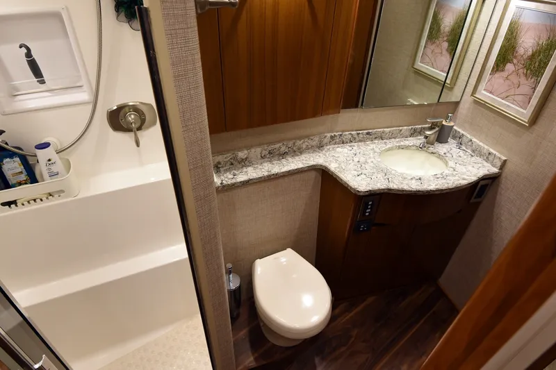 Slide: The Image of 2016 Viking 55 Convertible TAG Team Master Stateroom Head - 6452422