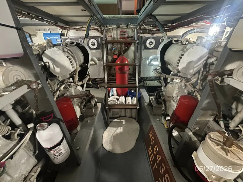 Slide: The Image of 42' Hatteras engine room forward - 6248055