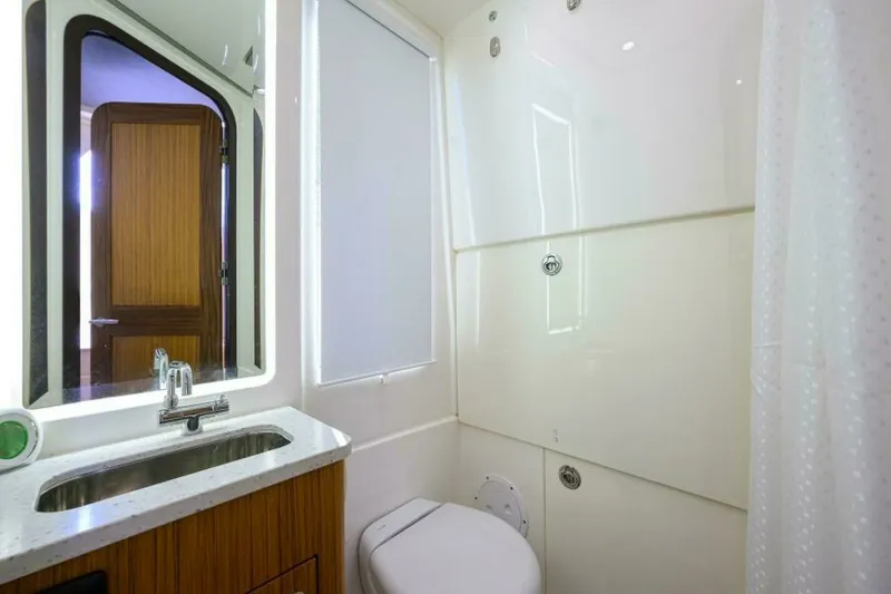 Slide: The Image of Solace 41 Cabin, Head 2021 Solace 41 Center Console - 7655753