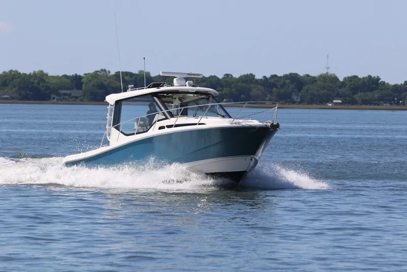 Slide: The Image of Boston Whaler 32 - SIP N SEA - Exterior Profile 2021 Boston Whaler 325 Conquest - SIP N SEA - 7655791