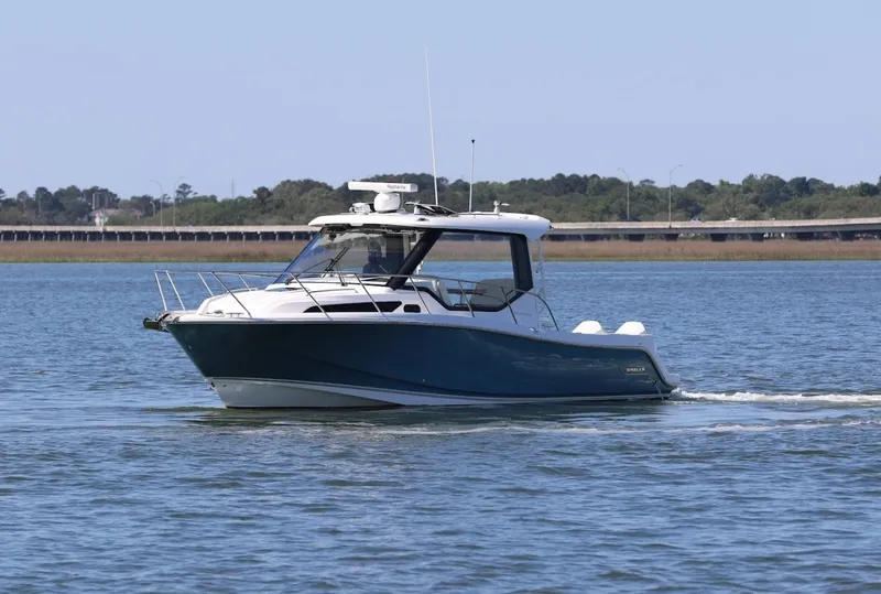 Slide: The Image of Boston Whaler 32 - SIP N SEA - Exterior Profile 2021 Boston Whaler 325 Conquest - SIP N SEA - 7655789