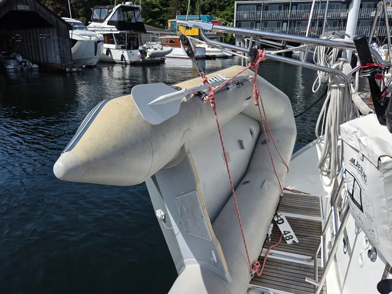 Slide: The Image of Inflatable dinghy secured on a 2000 Beneteau Oceanis 411  - 6257929