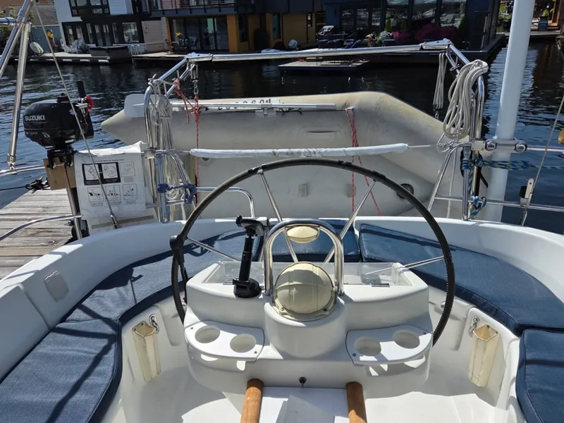 Slide: The Image of Cockpit of a 2000 Beneteau Oceanis 411 sailboat showing davits and dinghy - 6257931