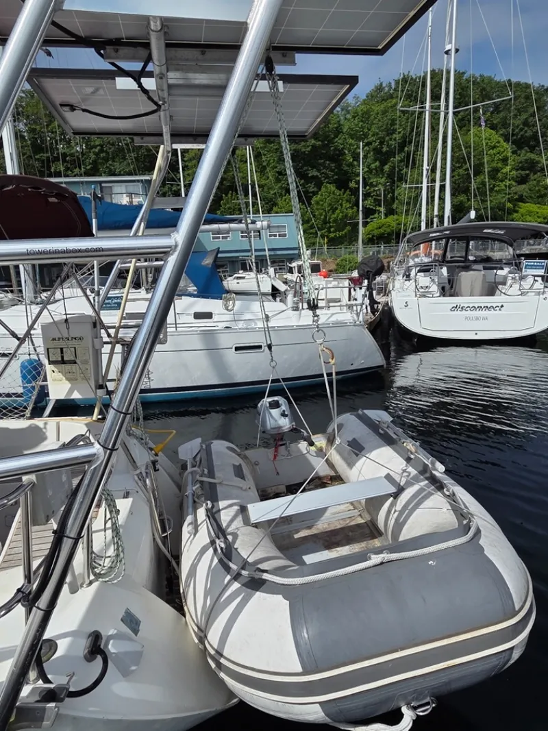 Slide: The Image of Dinghy w/ Honda outboard on davit system - 6257952