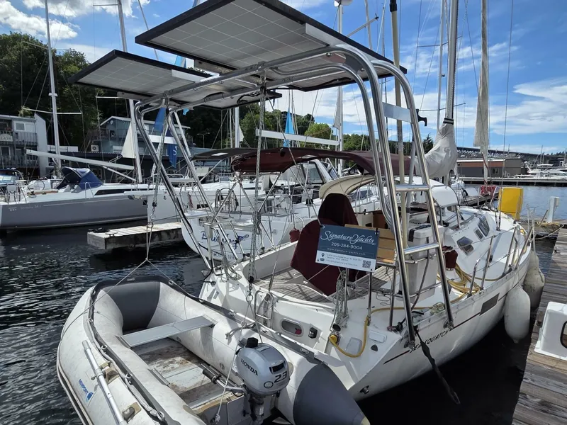 Slide: The Image of 1988 Beneteau Oceanis 350 with dinghy, davits, and solar - 6520975