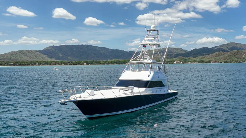 Slide: The Image of Viking 61 Convertible Bow View The 2005 Viking 61 Convertible, 'Honey Girl,' showcases its sleek bow cutting gracefully through the water. The clean lines and robust build highlight Viking's reputation for craftsmanship. Perfect for both fishing and leisure, this yacht is equipped with - 6449586